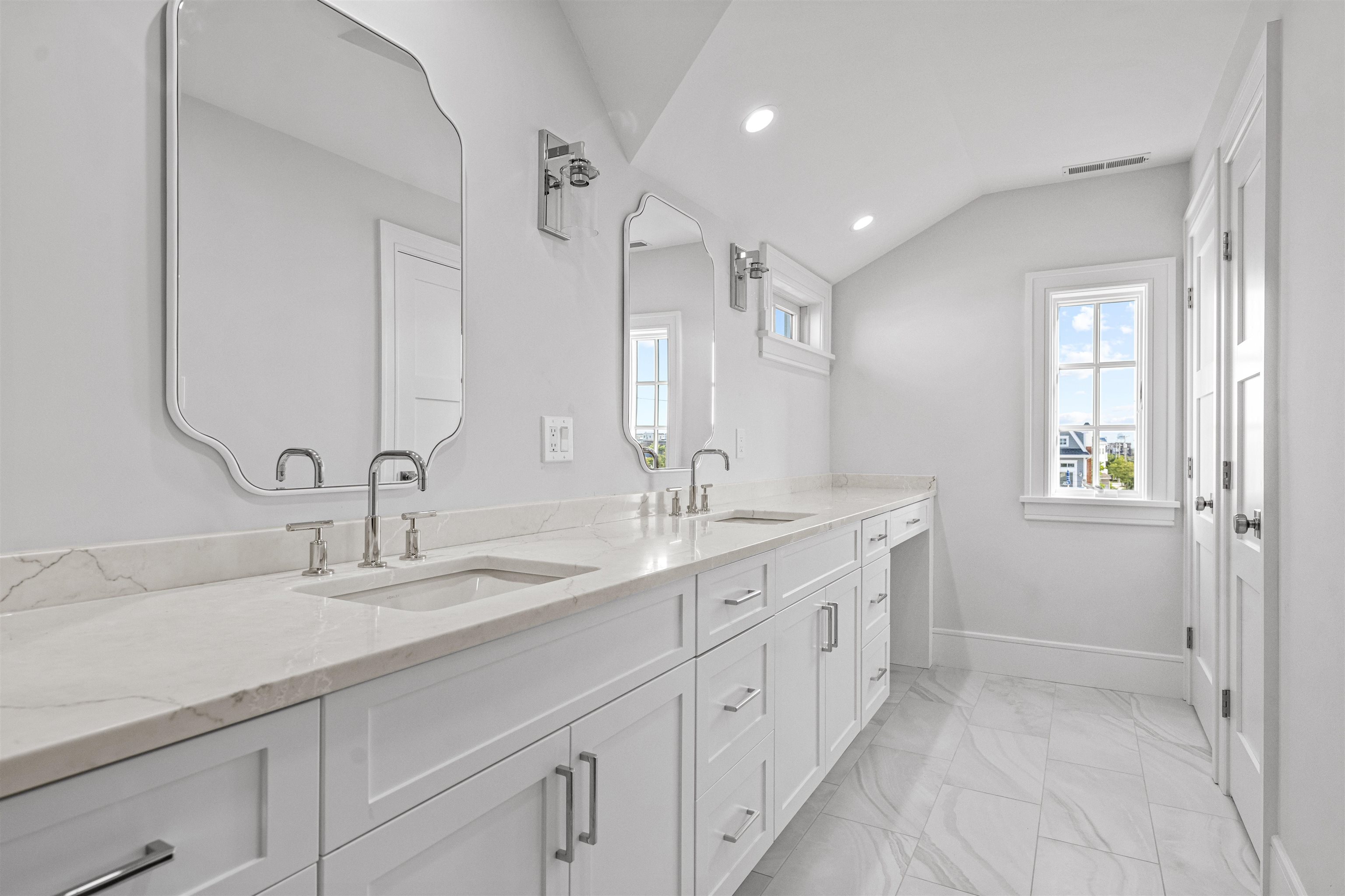 1819 Dune Drive Avalon, NJ 08202 - Photo 46 of 49 a bathroom with double sink and a mirror