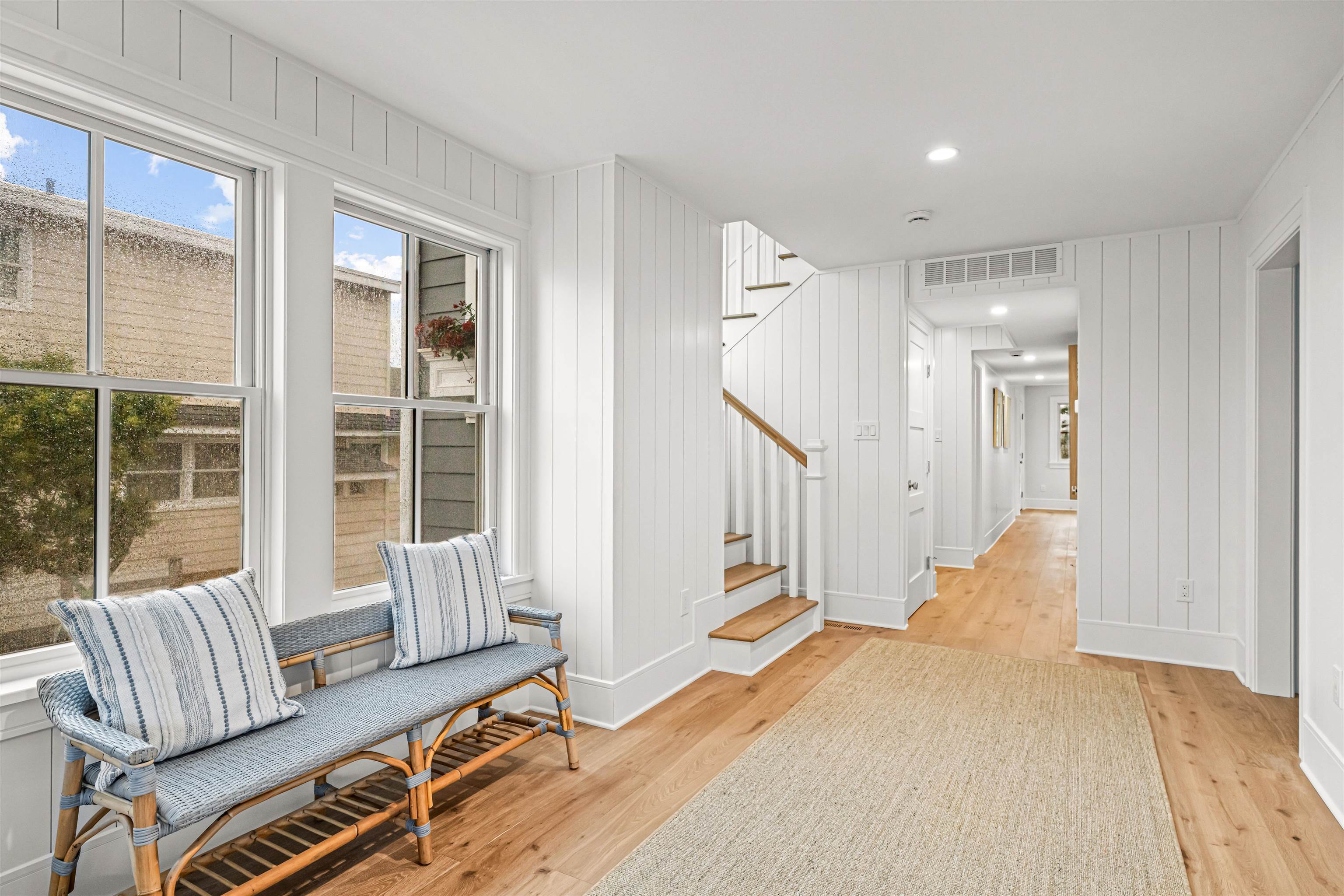 1819 Dune Drive Avalon, NJ 08202 - Photo 10 of 49 a view of an empty room with wooden floor and windows