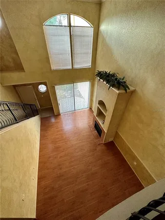 a view of an entryway with wooden floor