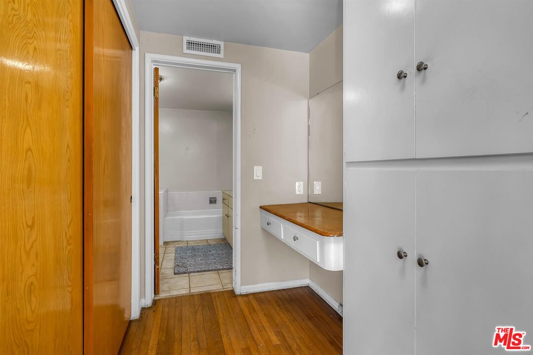 4320 Monteith Drive View Park, CA 90043 - Photo 12 of 17 a bathroom with a sink and a mirror