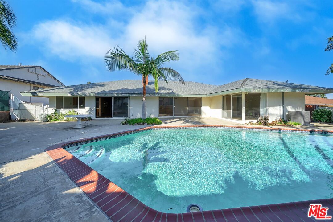4320 Monteith Drive View Park, CA 90043 - Photo 2 of 17 a view of a house with a swimming pool