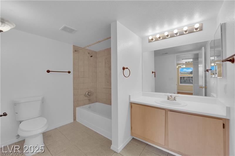 8101 West Flamingo Road, Unit 2030 Las Vegas, NV 89147 - Photo 26 of 27 A well-appointed bathroom with a spacious vanity and full bath, offering comfortable daily routines.