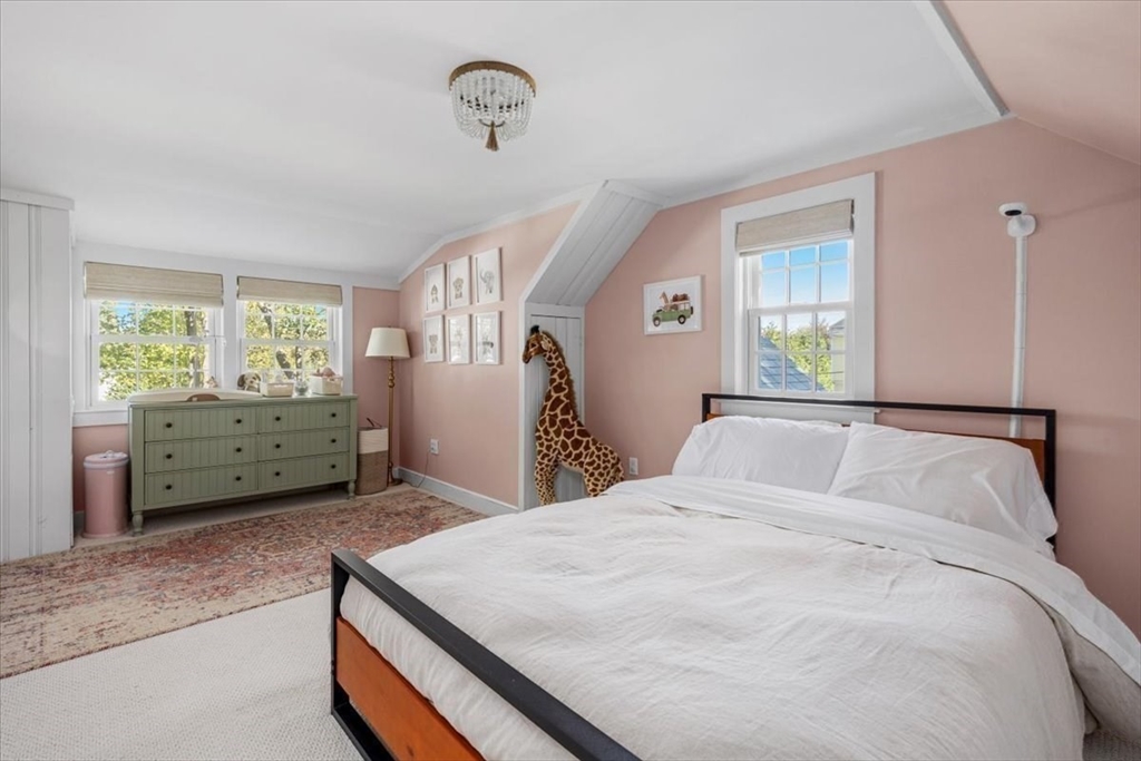 12 Merrymount Road Hingham, MA 02043 - Photo 15 of 18 a spacious bedroom with a bed and a window