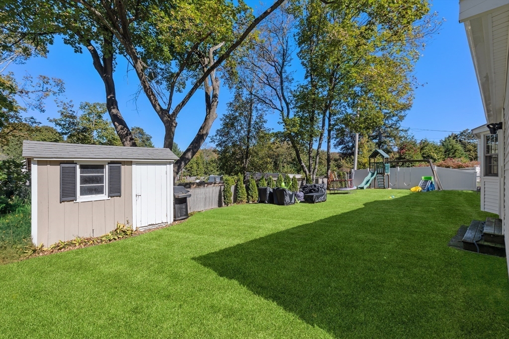 12 Merrymount Road Hingham, MA 02043 - Photo 16 of 18 a view of a yard with a house and garden