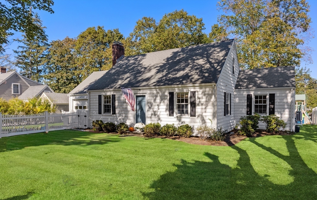 12 Merrymount Road Hingham, MA 02043 - Photo 17 of 18 a view of a house with a big yard and potted plants and large tree