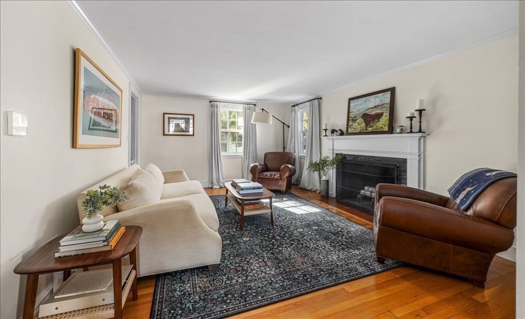 12 Merrymount Road Hingham, MA 02043 - Photo 3 of 18 a living room with furniture and a fireplace