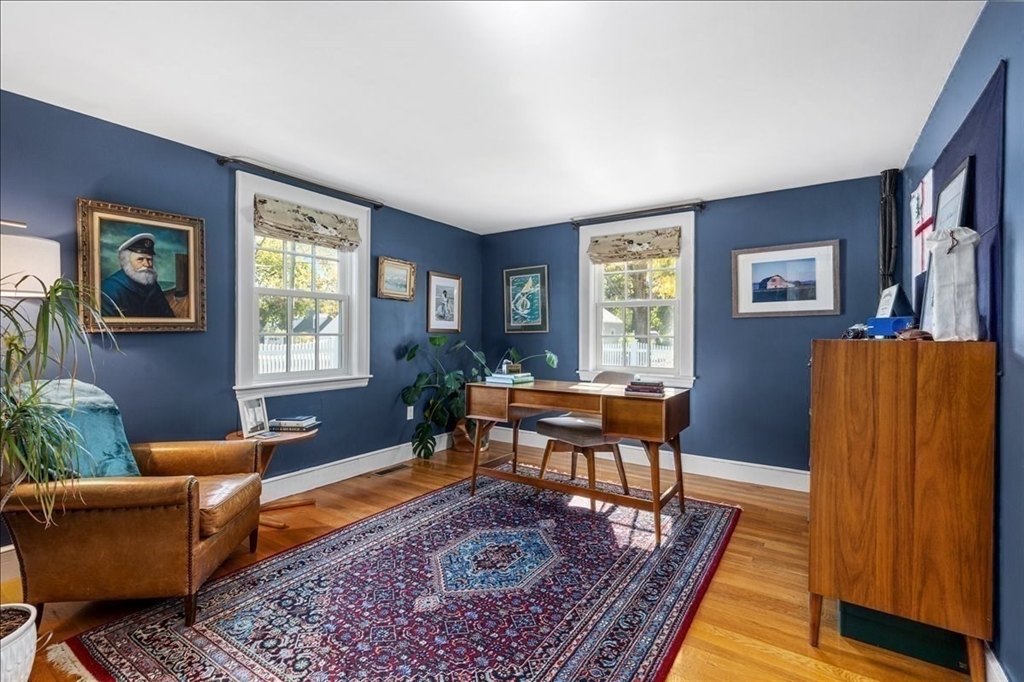 12 Merrymount Road Hingham, MA 02043 - Photo 5 of 18 a living room with furniture a rug and a window