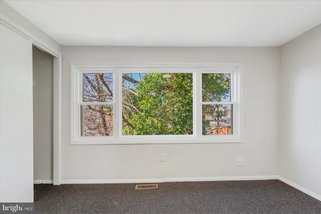 an empty room with a window