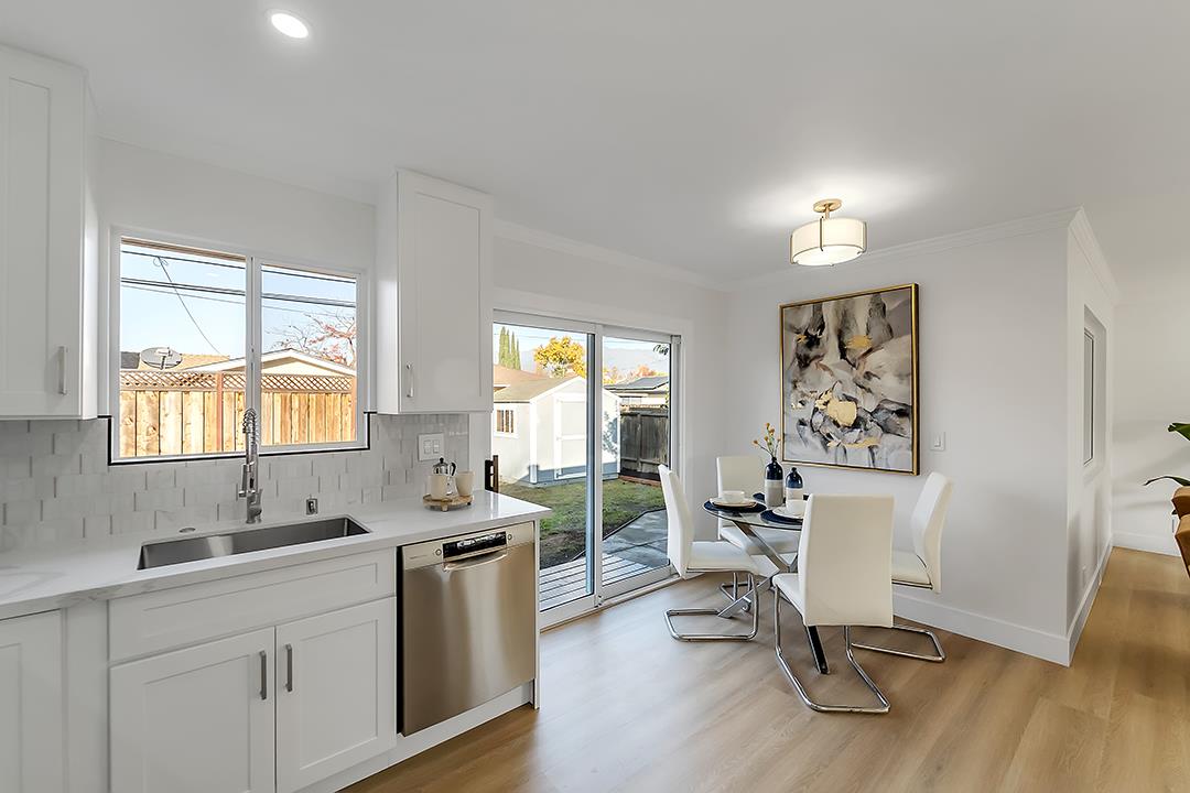 527 Maple Avenue Milpitas, CA 95035 - Photo 11 of 30 a kitchen that has a sink cabinets and window