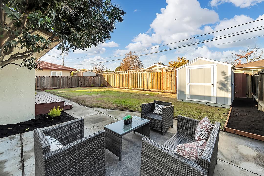 527 Maple Avenue Milpitas, CA 95035 - Photo 24 of 30 a view of a patio with couches chairs and a fire pit