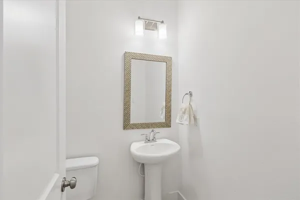 a bathroom with a sink and a toilet