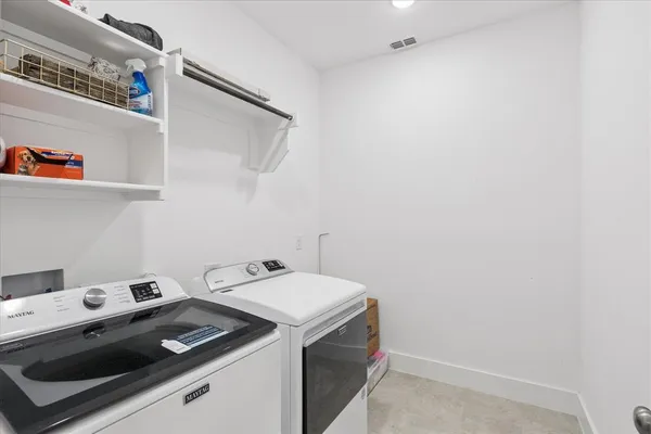 a room with closet and wooden floor