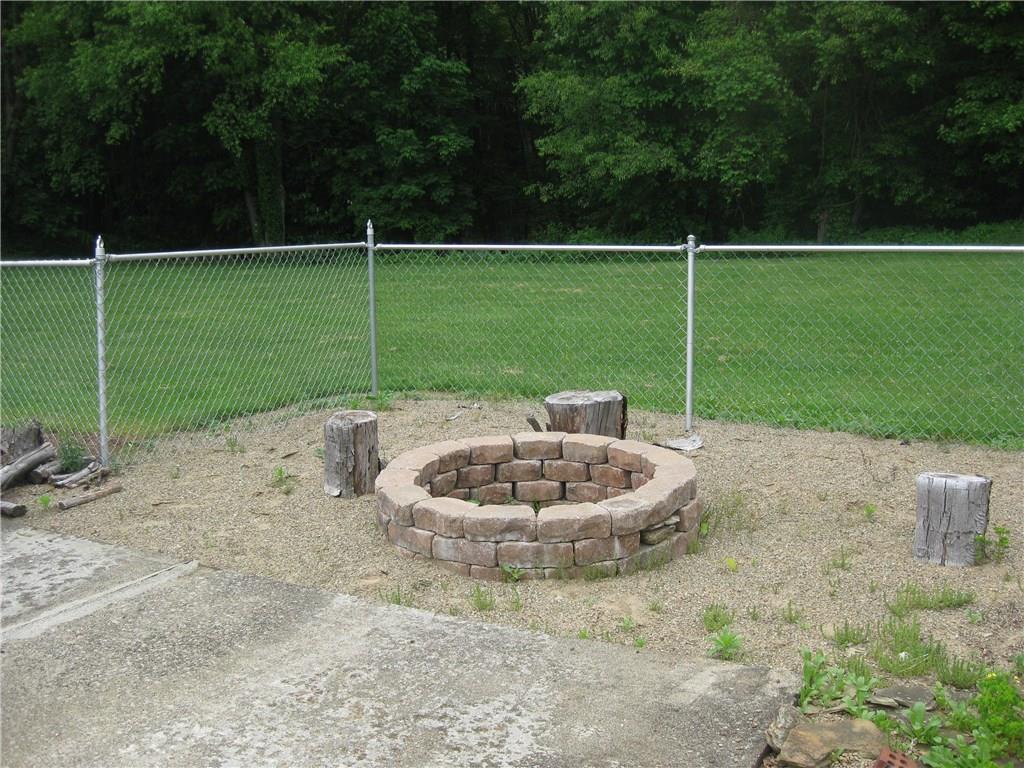 93 Falls Road Mercer, PA 16137 - Photo 23 of 25 Fire pit in pool area