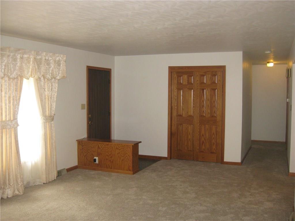 93 Falls Road Mercer, PA 16137 - Photo 5 of 25 Living room....new oak everywhere....solid raised 6 panel doors thru out the home.