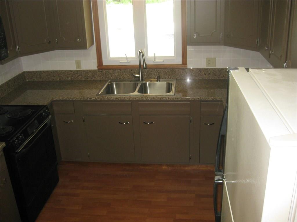 93 Falls Road Mercer, PA 16137 - Photo 9 of 25 Kitchen, new granite counter tops and back splash!