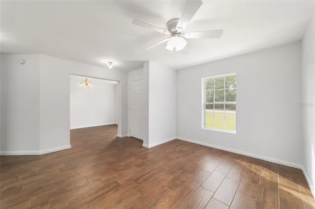 a large bathroom with a sink a large mirror and shower