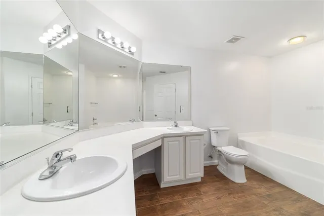 a view of a swimming pool with an ocean view