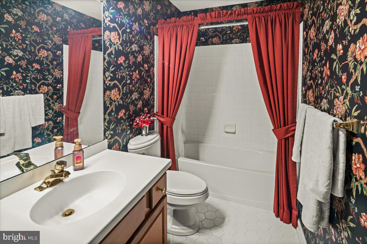 9 Spring Lake Court Barnegat, NJ 08005 - Photo 39 of 68 a bathroom with a sink toilet and shower