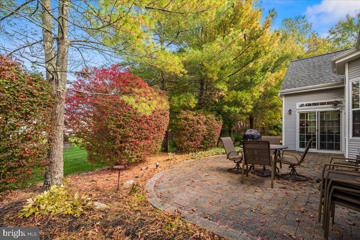 9 Spring Lake Court Barnegat, NJ 08005 - Photo 48 of 68 a view of a patio with table and chairs and potted plants