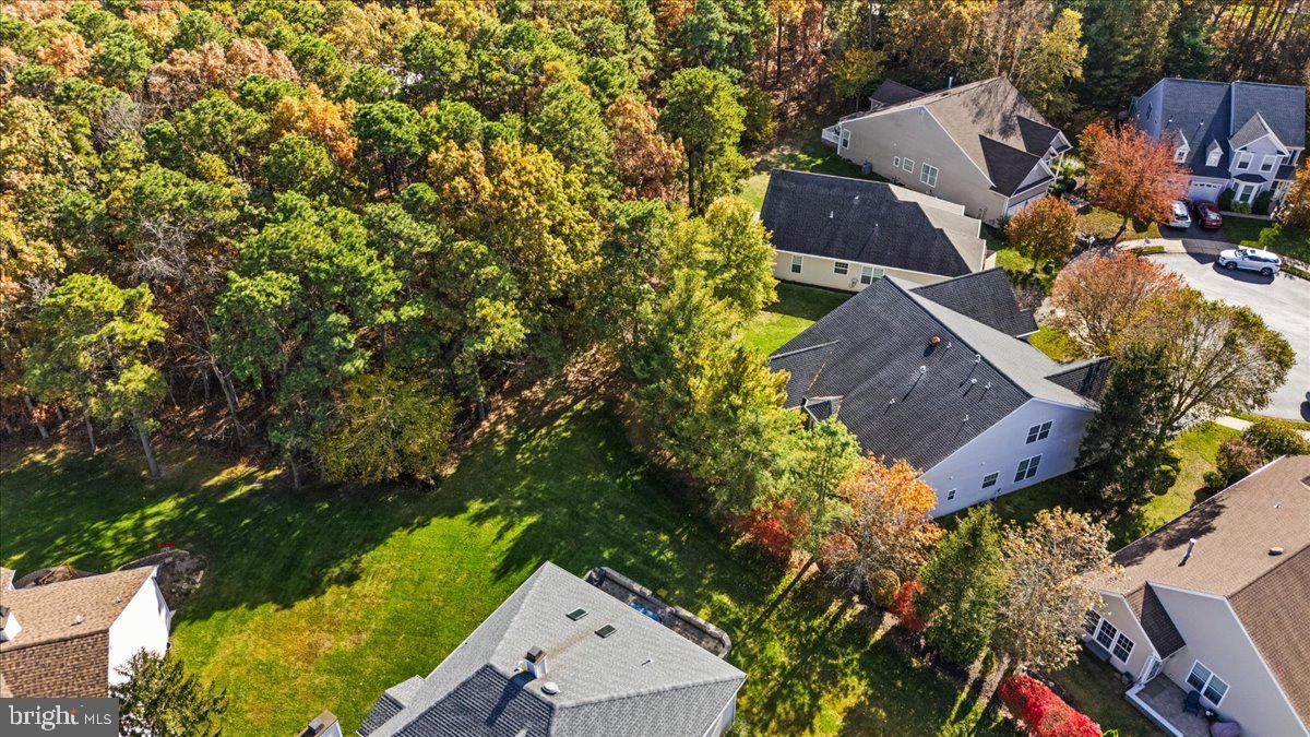 9 Spring Lake Court Barnegat, NJ 08005 - Photo 58 of 68 an aerial view of a house with a yard and garden
