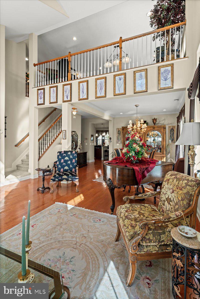 9 Spring Lake Court Barnegat, NJ 08005 - Photo 6 of 68 a outdoor living space with furniture and a potted plant