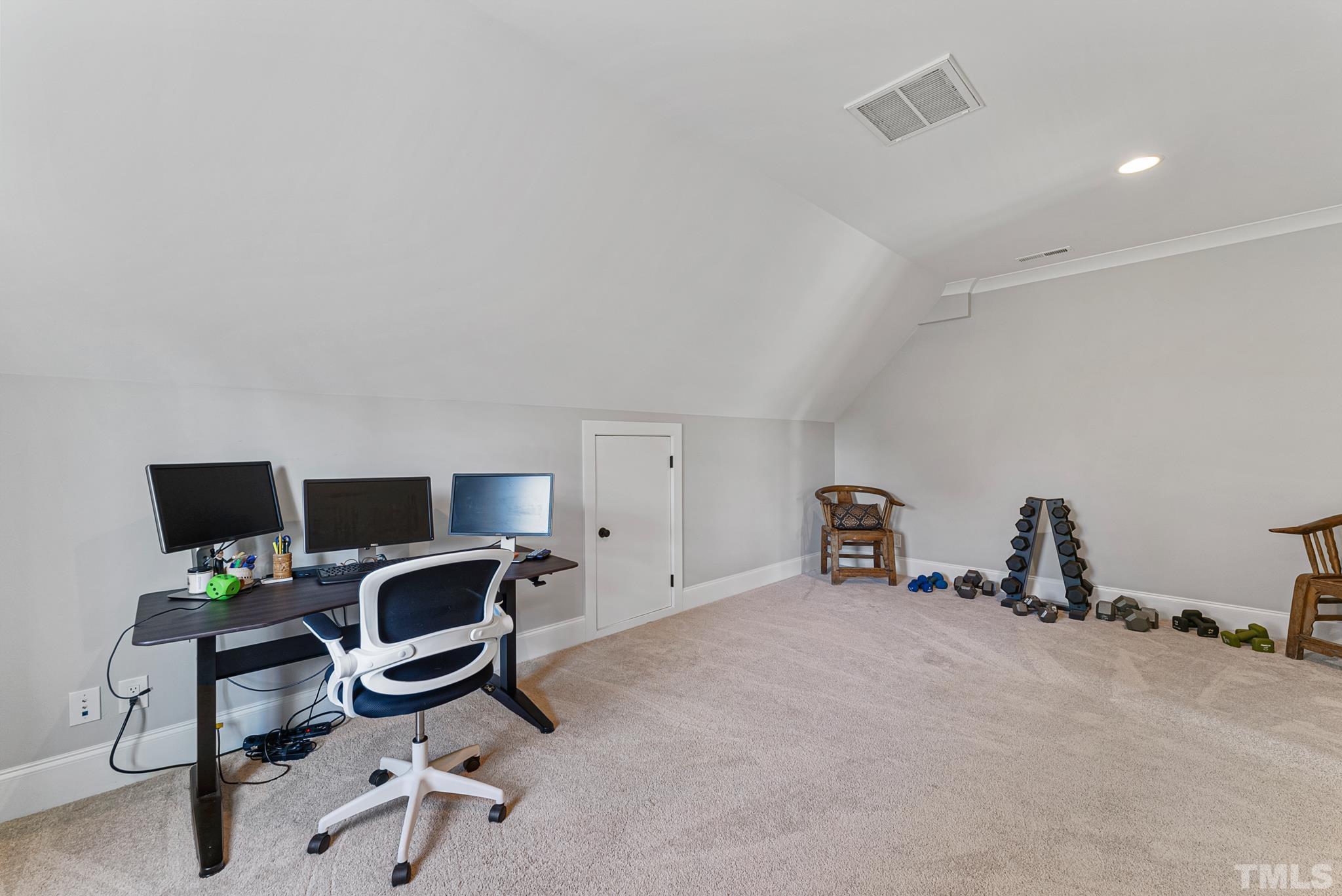 702 Cranbrook Road Raleigh, NC 27609 - Photo 42 of 57 a view of a workspace with furniture