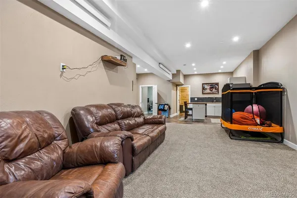 a living room with furniture and a couch