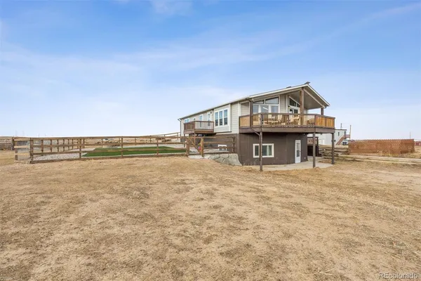 a view of house with ocean view