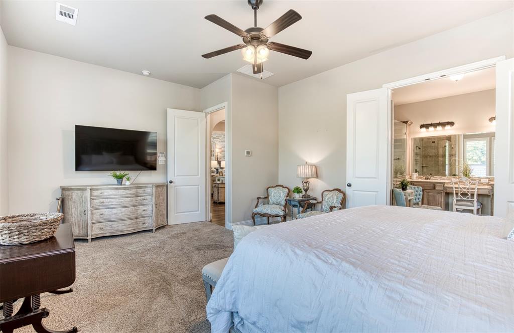 7760 Hackamore Street Frisco, TX 75036 - Photo 17 of 40 Spacious primary bedroom with luxurious en-suite bathroom