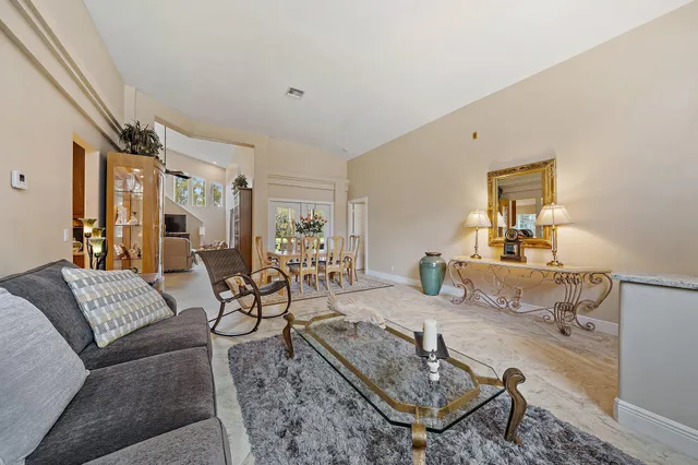 a living room with furniture and a couch