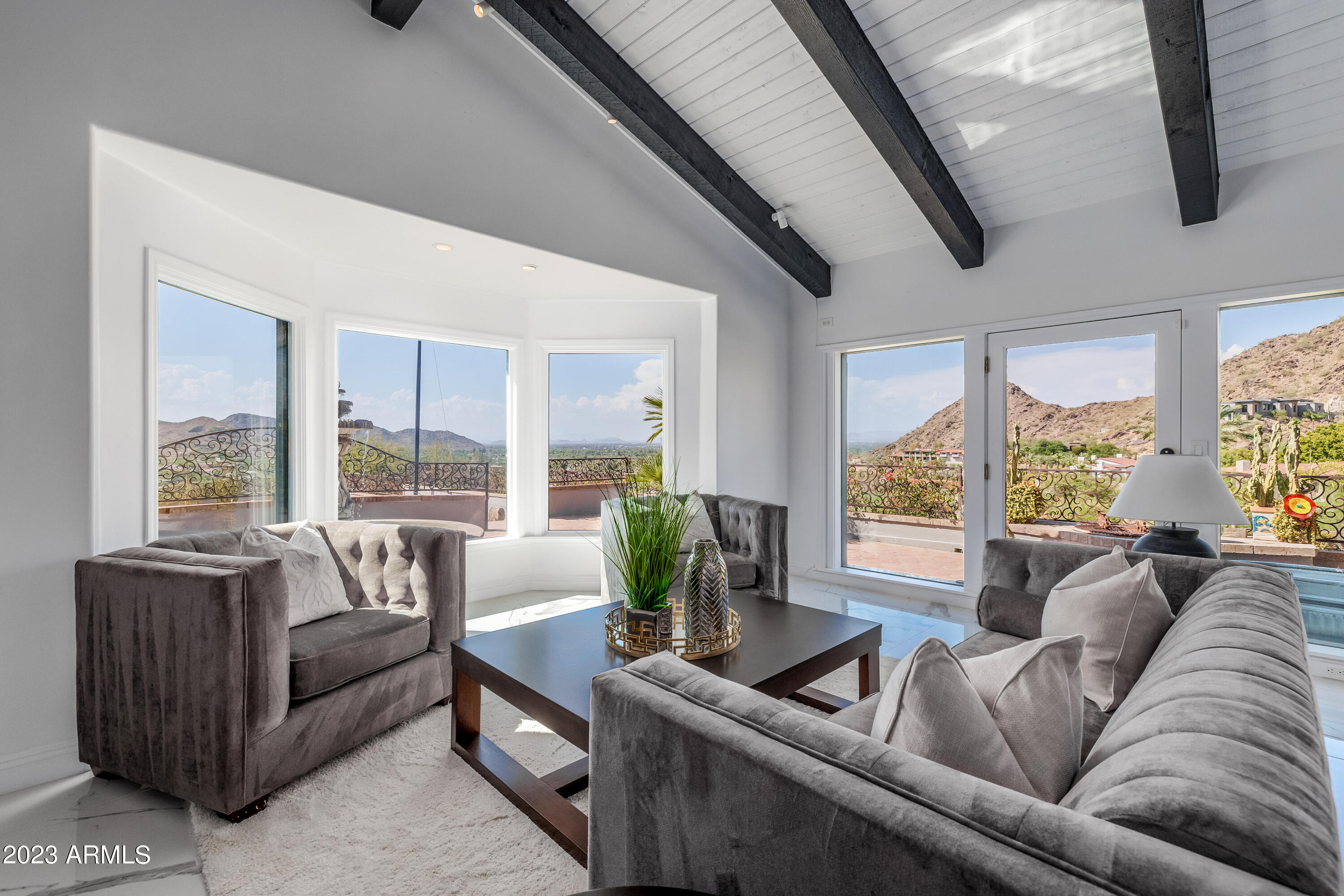 5339 East Desert Vista Road Paradise Valley, AZ 85253 - Photo 15 of 93 a living room with furniture and a large window