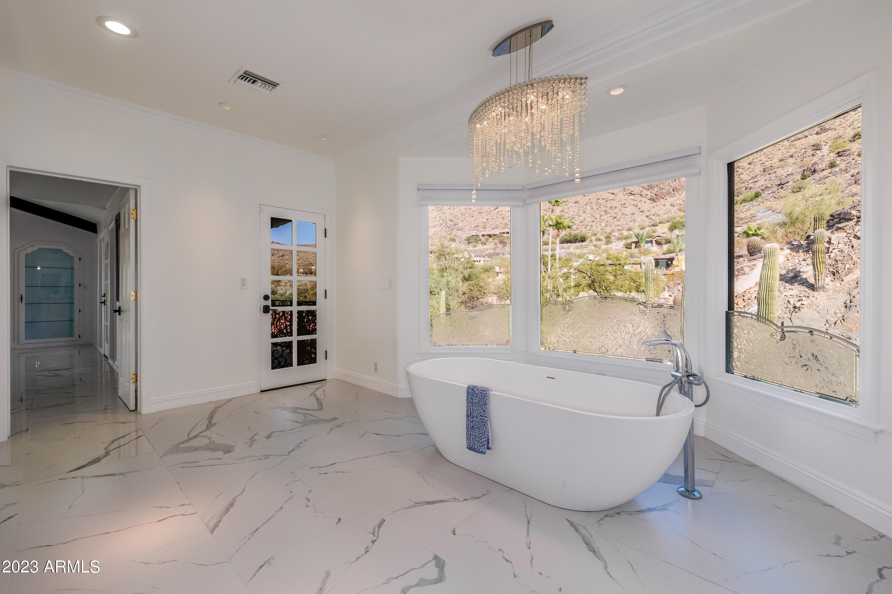 5339 East Desert Vista Road Paradise Valley, AZ 85253 - Photo 32 of 93 a spacious bathroom with a tub and shower