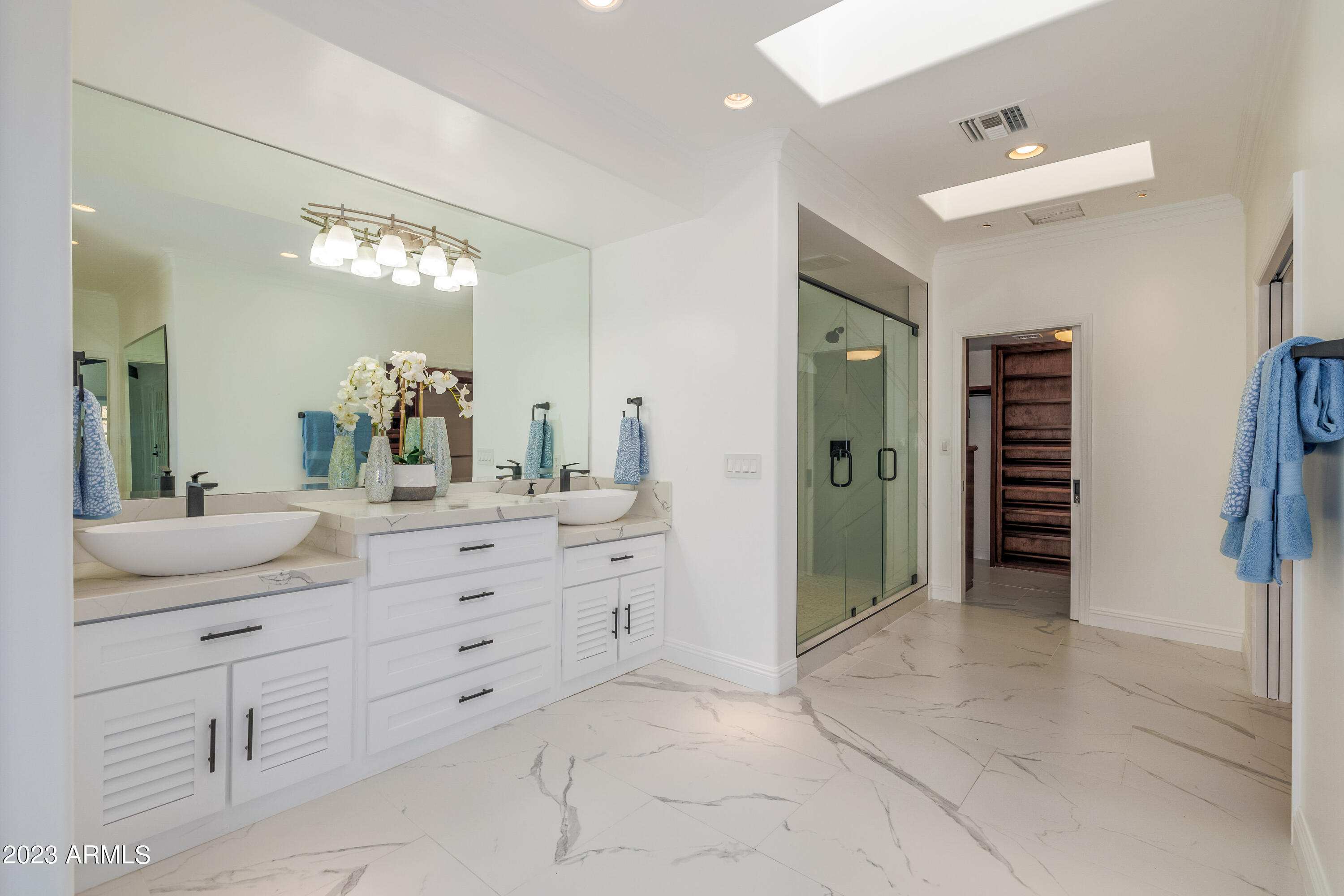 5339 East Desert Vista Road Paradise Valley, AZ 85253 - Photo 34 of 93 a bathroom with a sink and a mirror