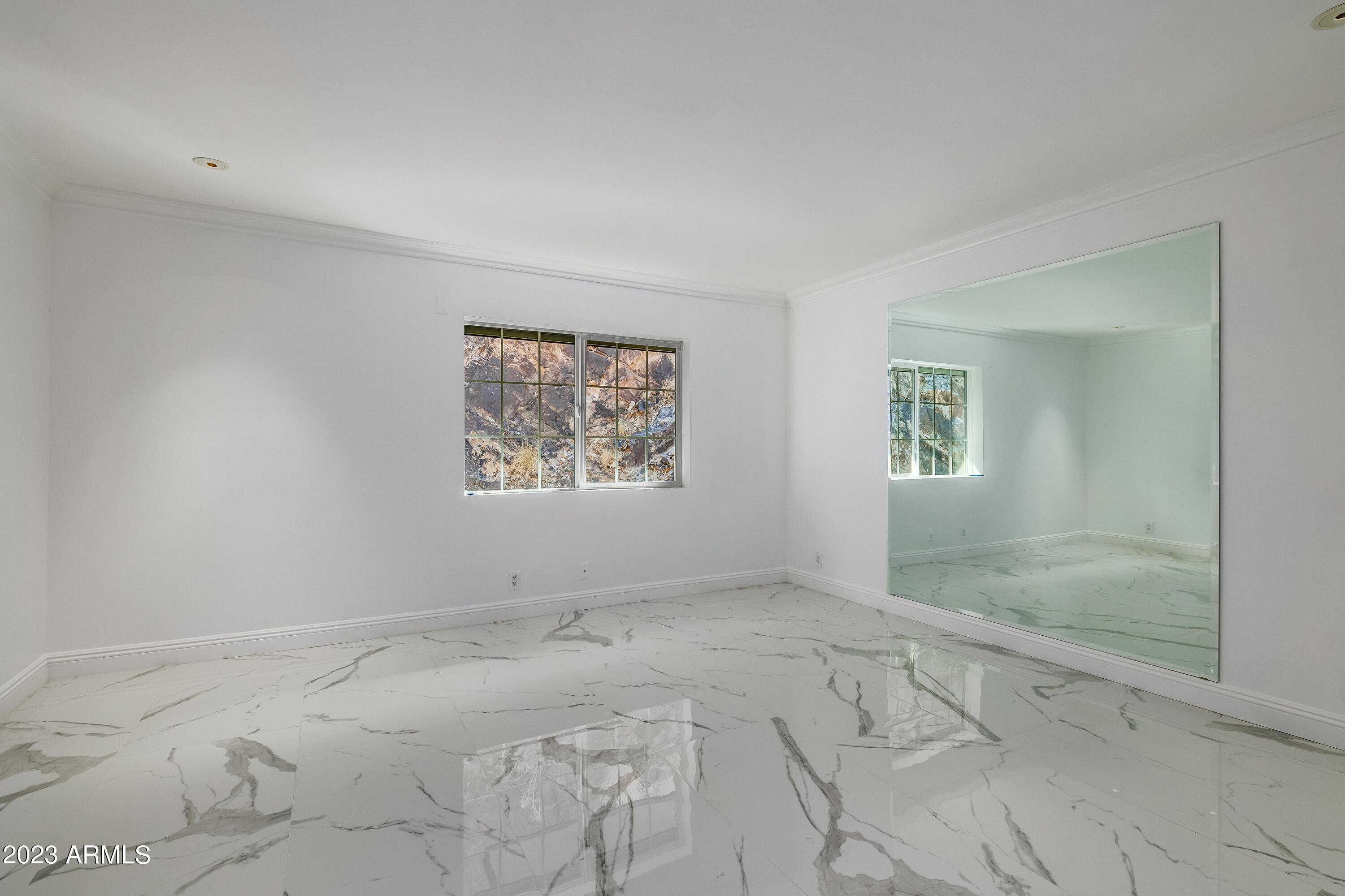 5339 East Desert Vista Road Paradise Valley, AZ 85253 - Photo 39 of 93 a view of an empty room with a window