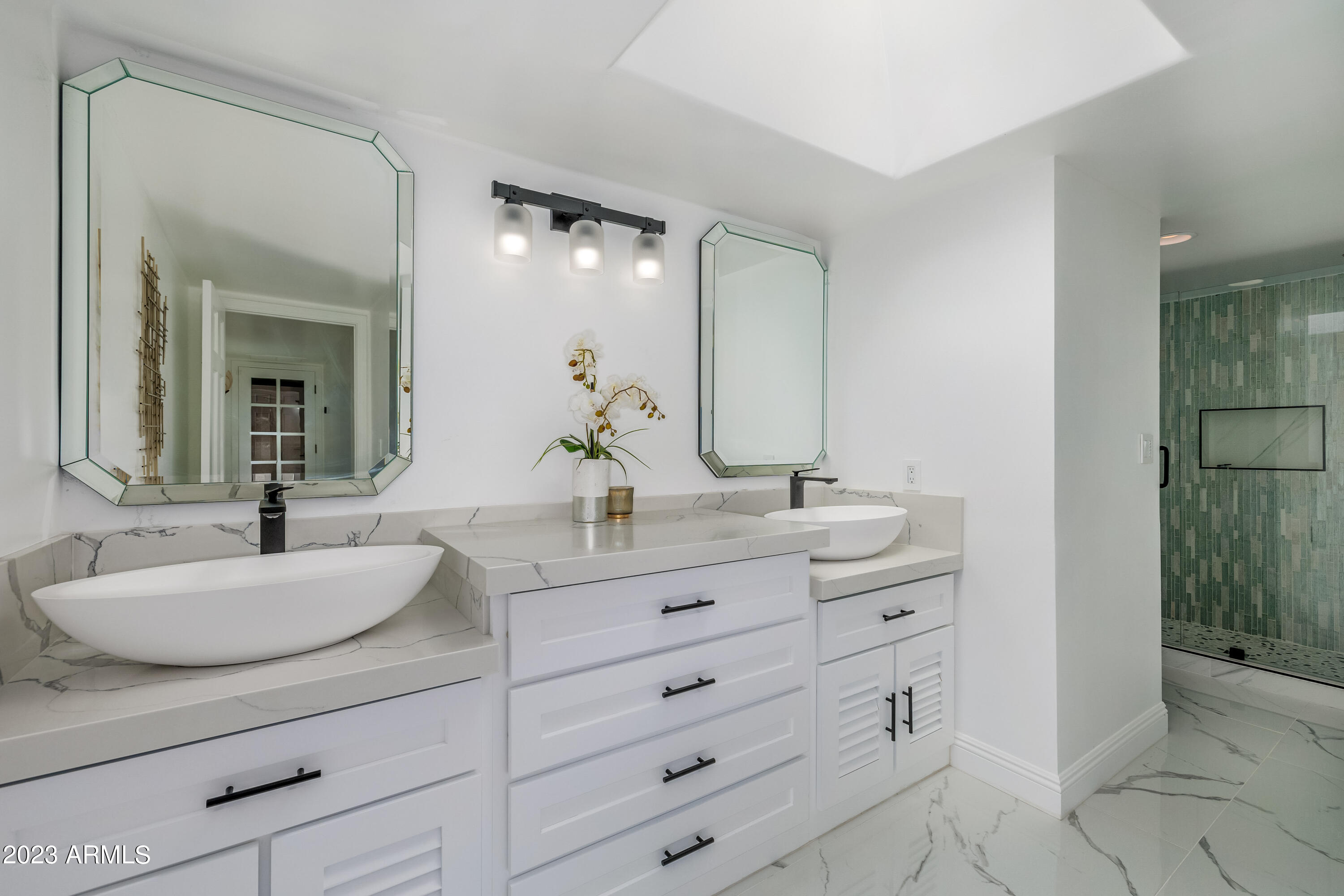 5339 East Desert Vista Road Paradise Valley, AZ 85253 - Photo 40 of 93 a bathroom with a granite countertop sink mirror and double
