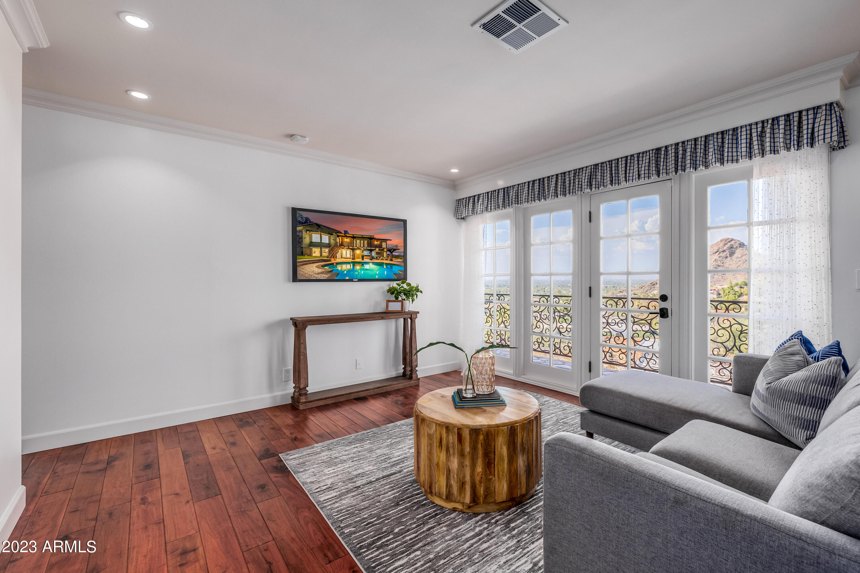 5339 East Desert Vista Road Paradise Valley, AZ 85253 - Photo 48 of 93 a living room with furniture and a window