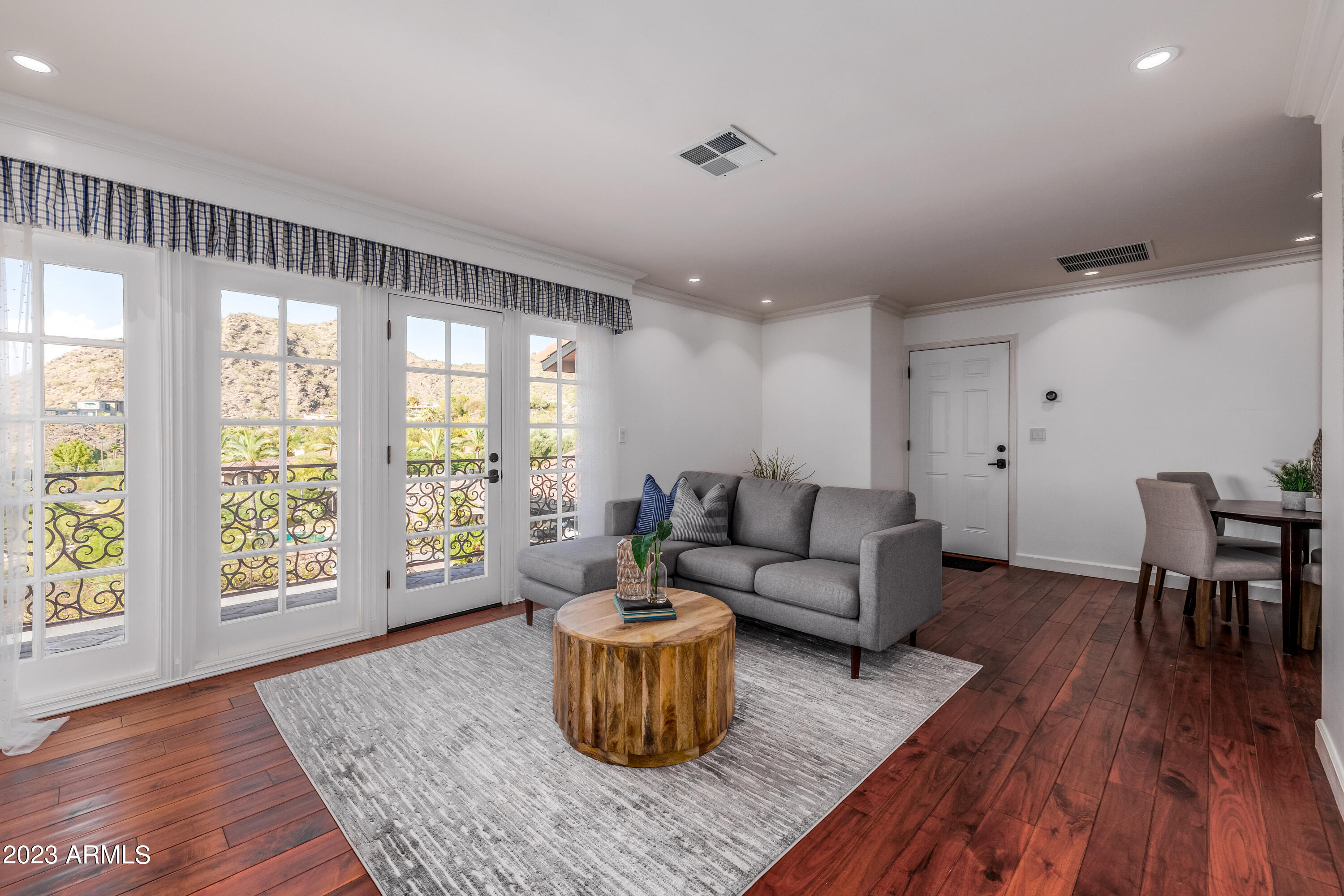 5339 East Desert Vista Road Paradise Valley, AZ 85253 - Photo 49 of 93 a living room with furniture and a wooden floor