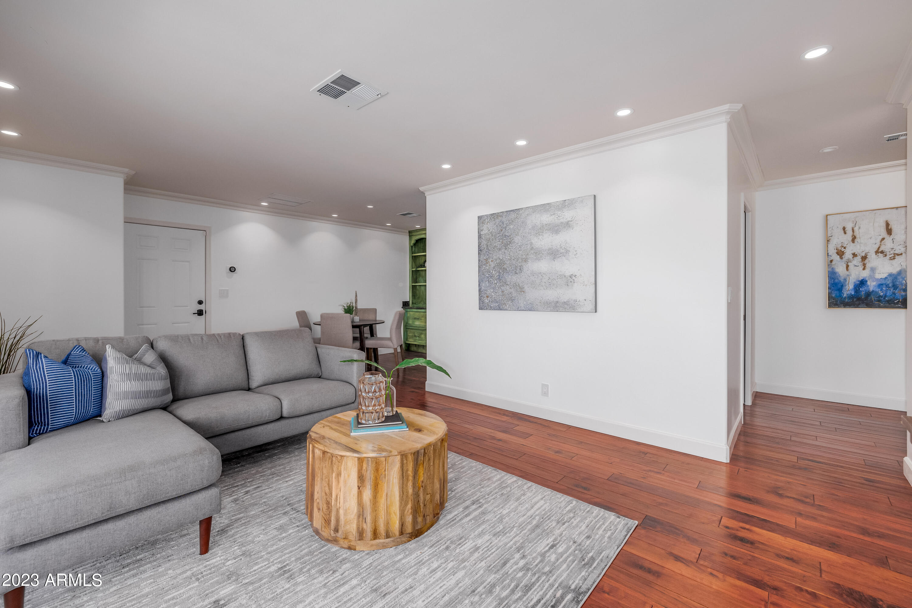 5339 East Desert Vista Road Paradise Valley, AZ 85253 - Photo 50 of 93 a living room with furniture and a wooden floor