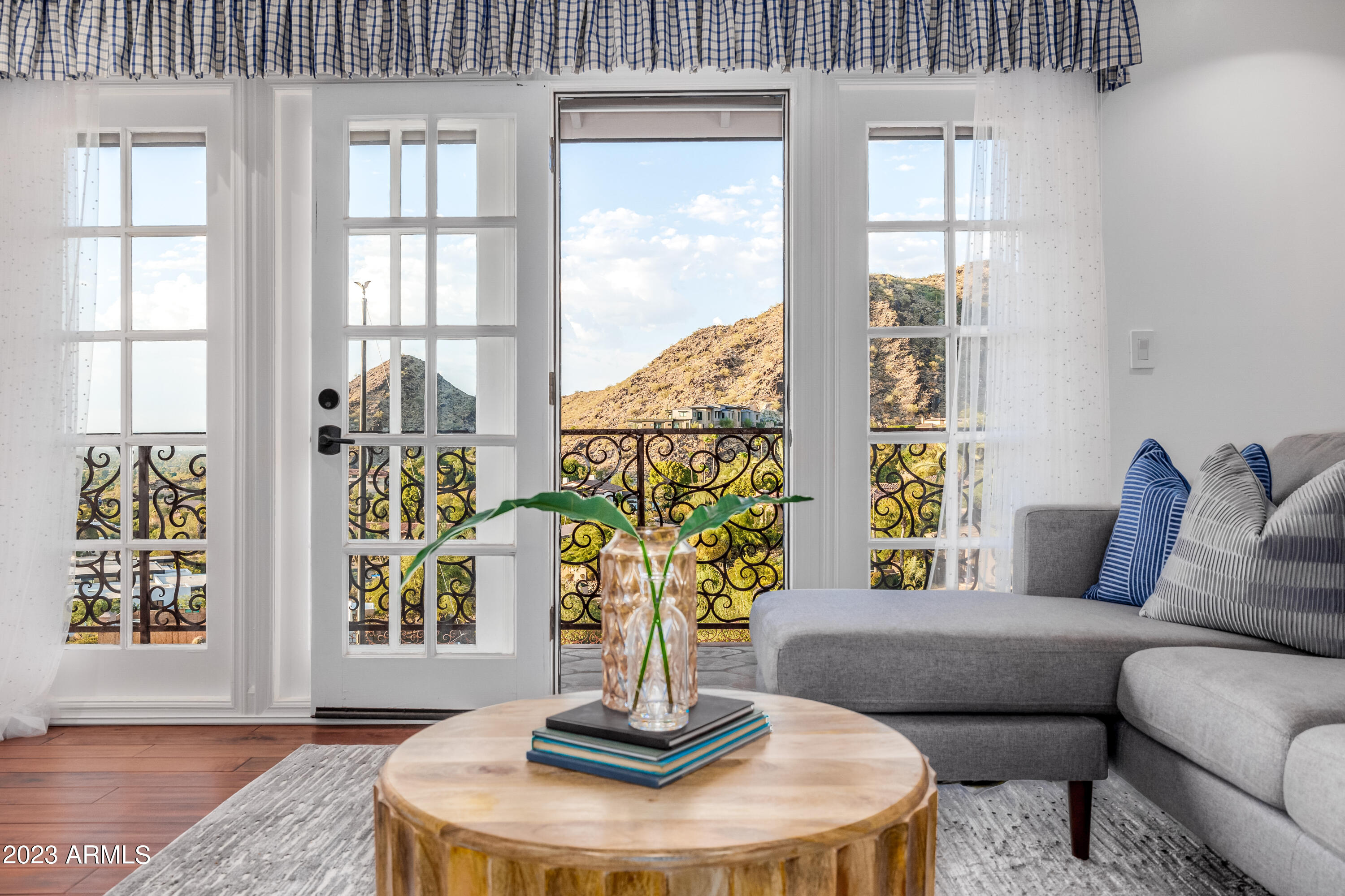 5339 East Desert Vista Road Paradise Valley, AZ 85253 - Photo 51 of 93 a living room with furniture and a large window