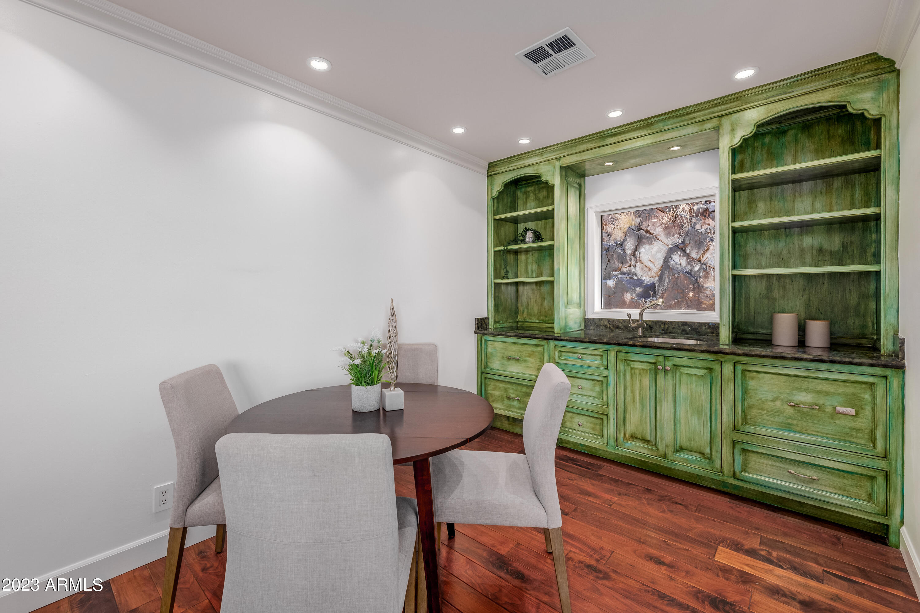 5339 East Desert Vista Road Paradise Valley, AZ 85253 - Photo 54 of 93 a view of a dining room with furniture window and wooden floor