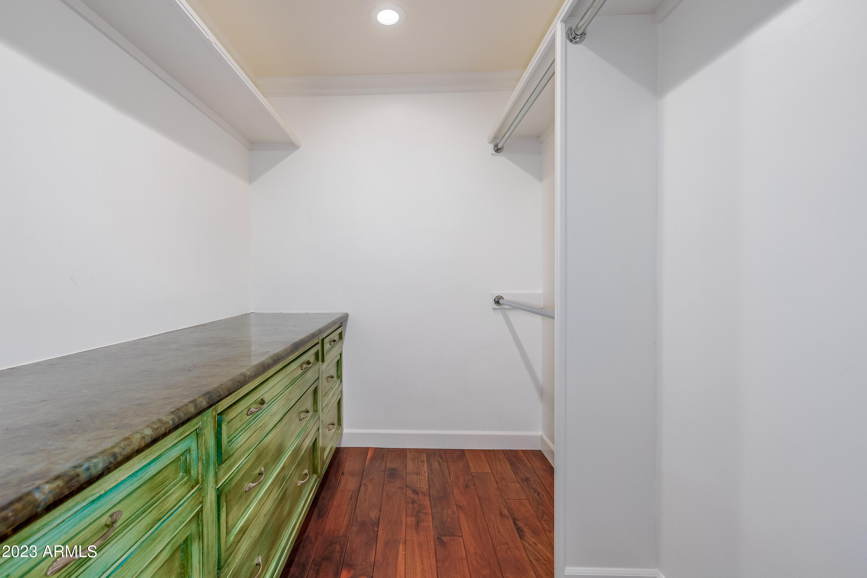 5339 East Desert Vista Road Paradise Valley, AZ 85253 - Photo 55 of 93 a room with wooden floor and a sink