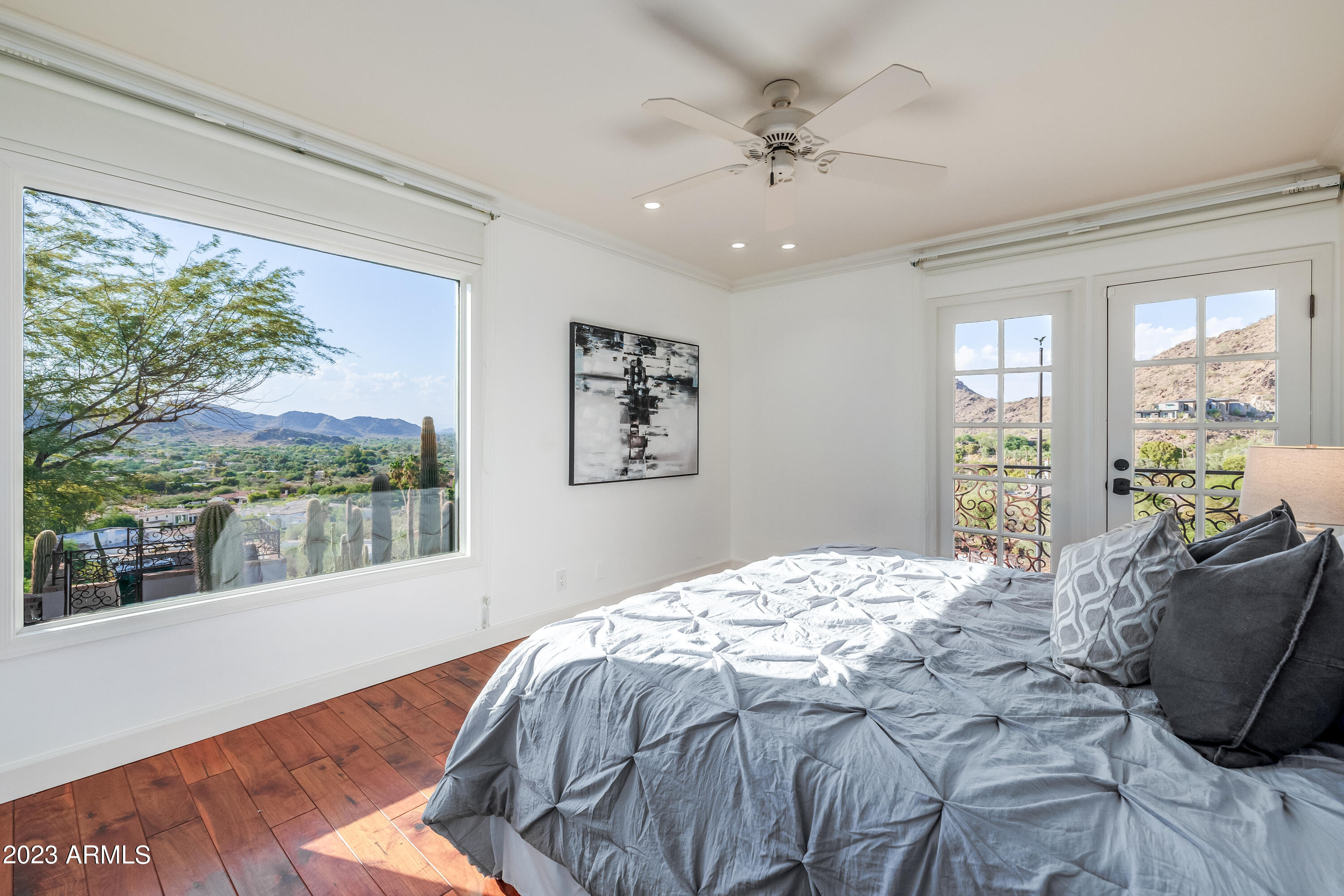 5339 East Desert Vista Road Paradise Valley, AZ 85253 - Photo 56 of 93 a bed sitting in a spacious bedroom next to a window