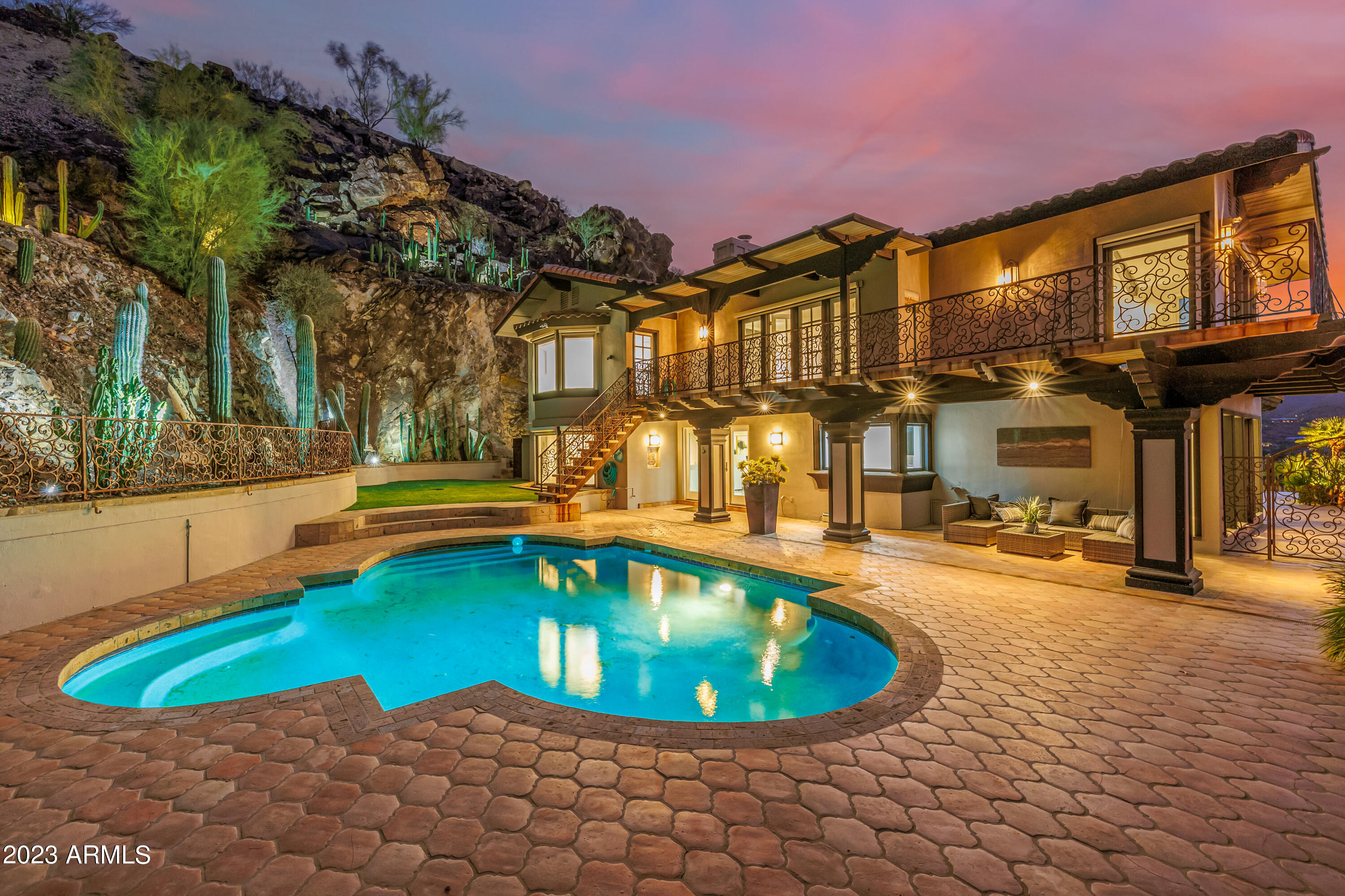 5339 East Desert Vista Road Paradise Valley, AZ 85253 - Photo 60 of 93 a view of a swimming pool with a patio