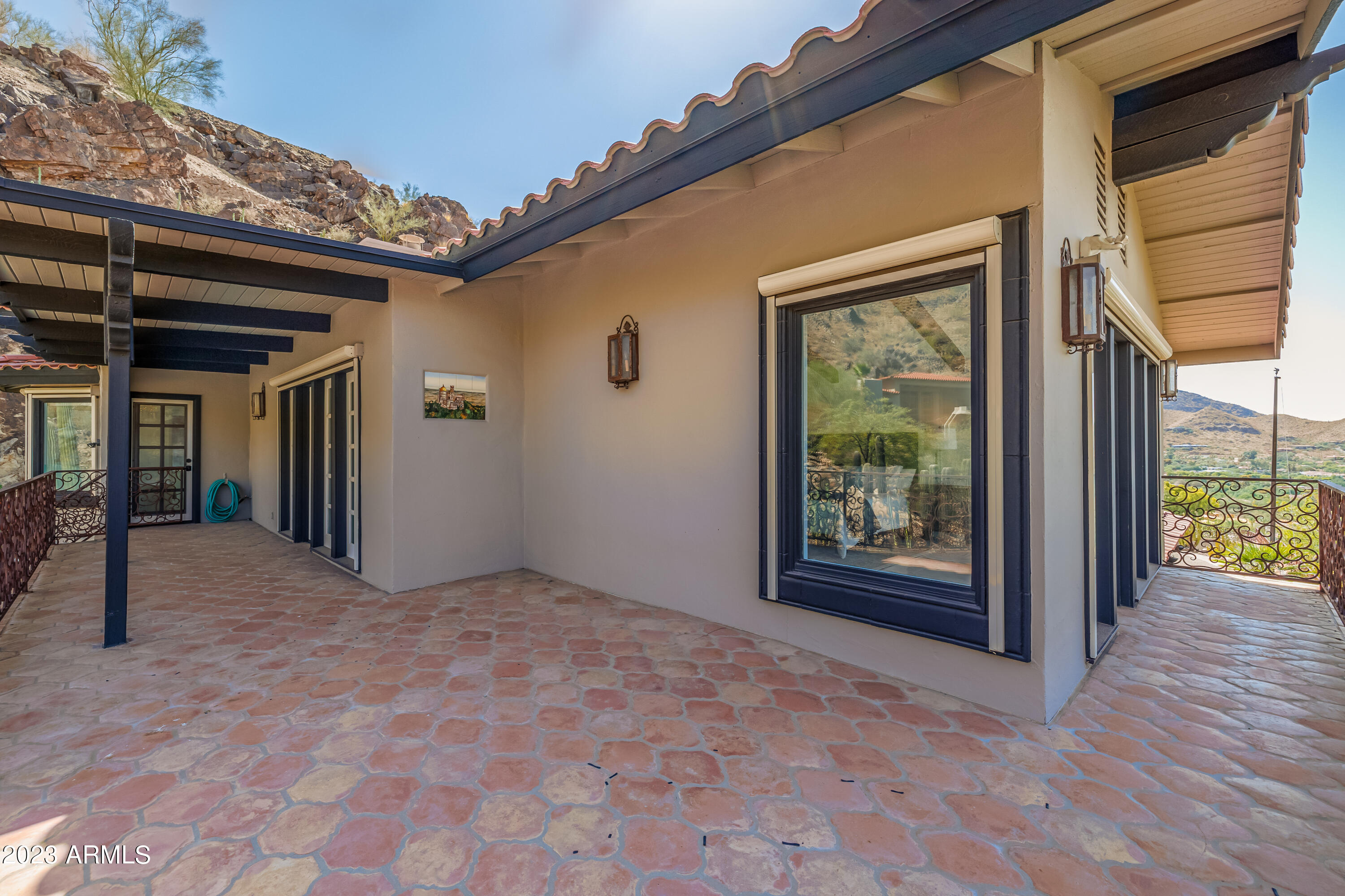 5339 East Desert Vista Road Paradise Valley, AZ 85253 - Photo 72 of 93 a view of an empty room with wooden floor and a window