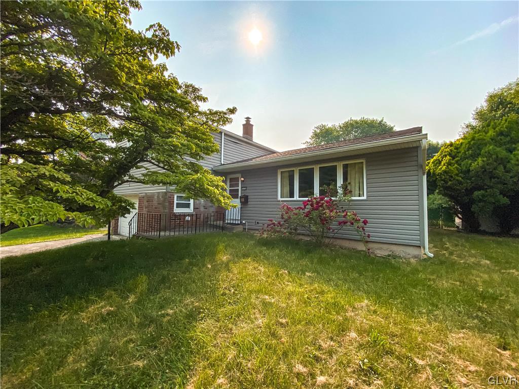 1934 Windsor Road Bethlehem, PA 18017 - Photo 1 of 32 a view of a house with a yard