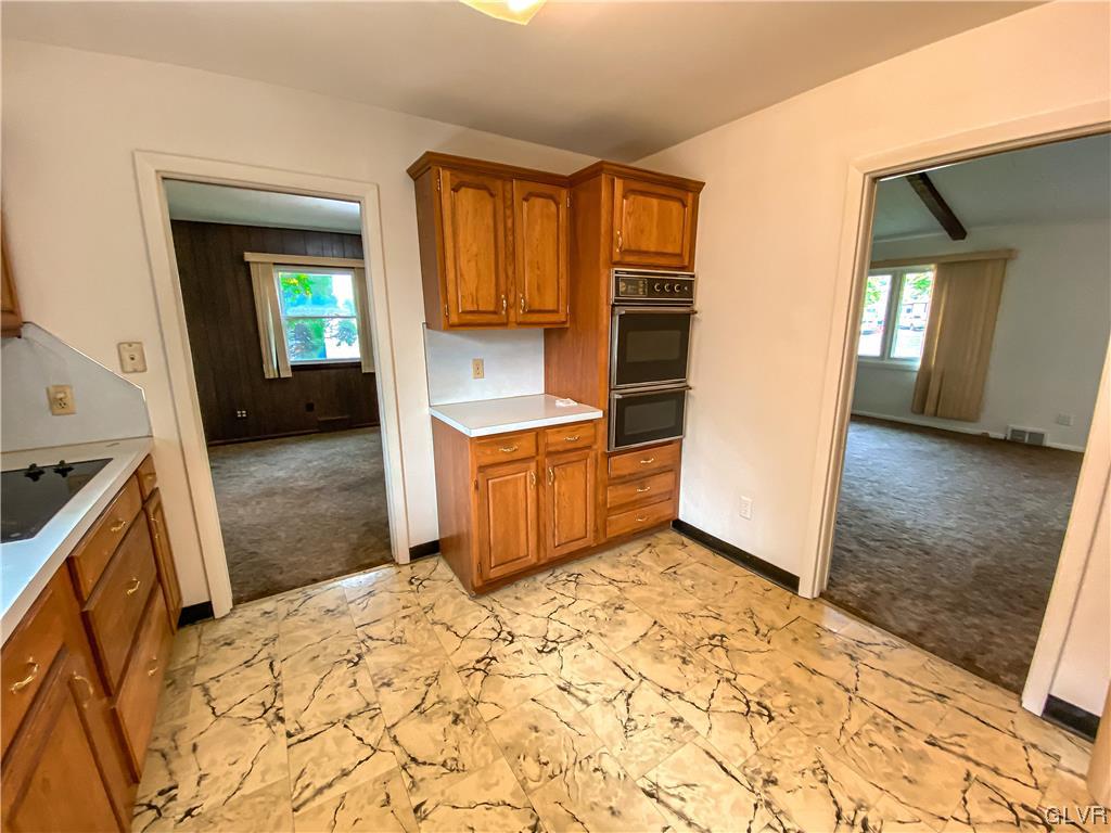 1934 Windsor Road Bethlehem, PA 18017 - Photo 11 of 32 a view of a kitchen with a sink and cabinets