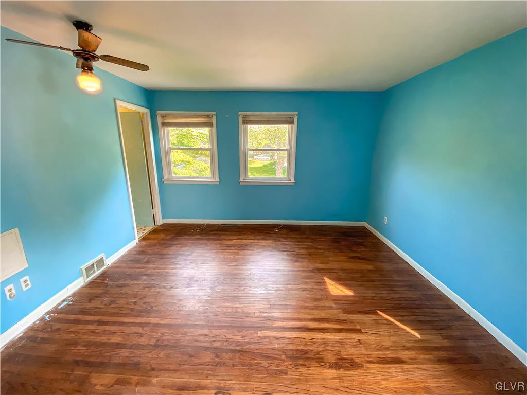 1934 Windsor Road Bethlehem, PA 18017 - Photo 13 of 32 a view of empty room with wooden floor and fan
