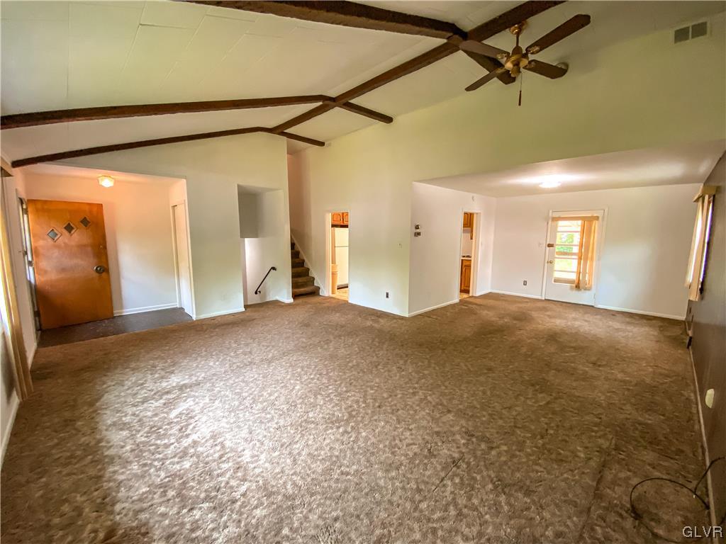 1934 Windsor Road Bethlehem, PA 18017 - Photo 4 of 32 a view of a big room with wooden floor and windows