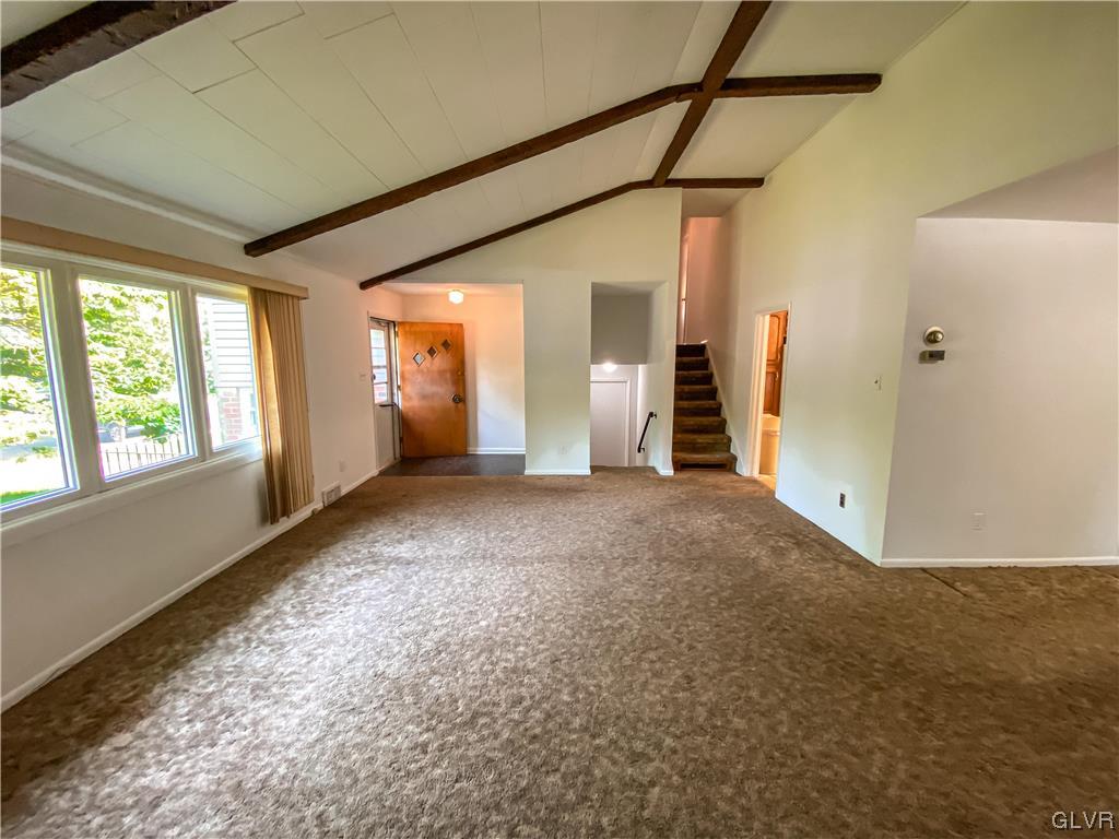 1934 Windsor Road Bethlehem, PA 18017 - Photo 5 of 32 a view of a big room with windows and chandelier