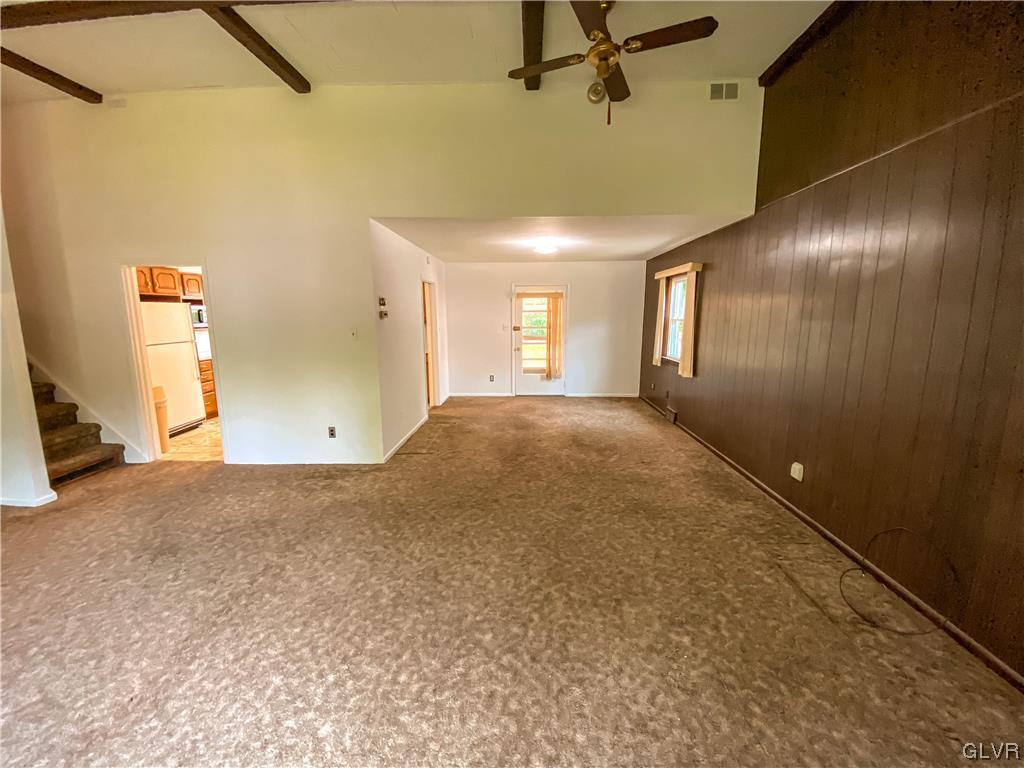 1934 Windsor Road Bethlehem, PA 18017 - Photo 7 of 32 a view of a livingroom with a staircase